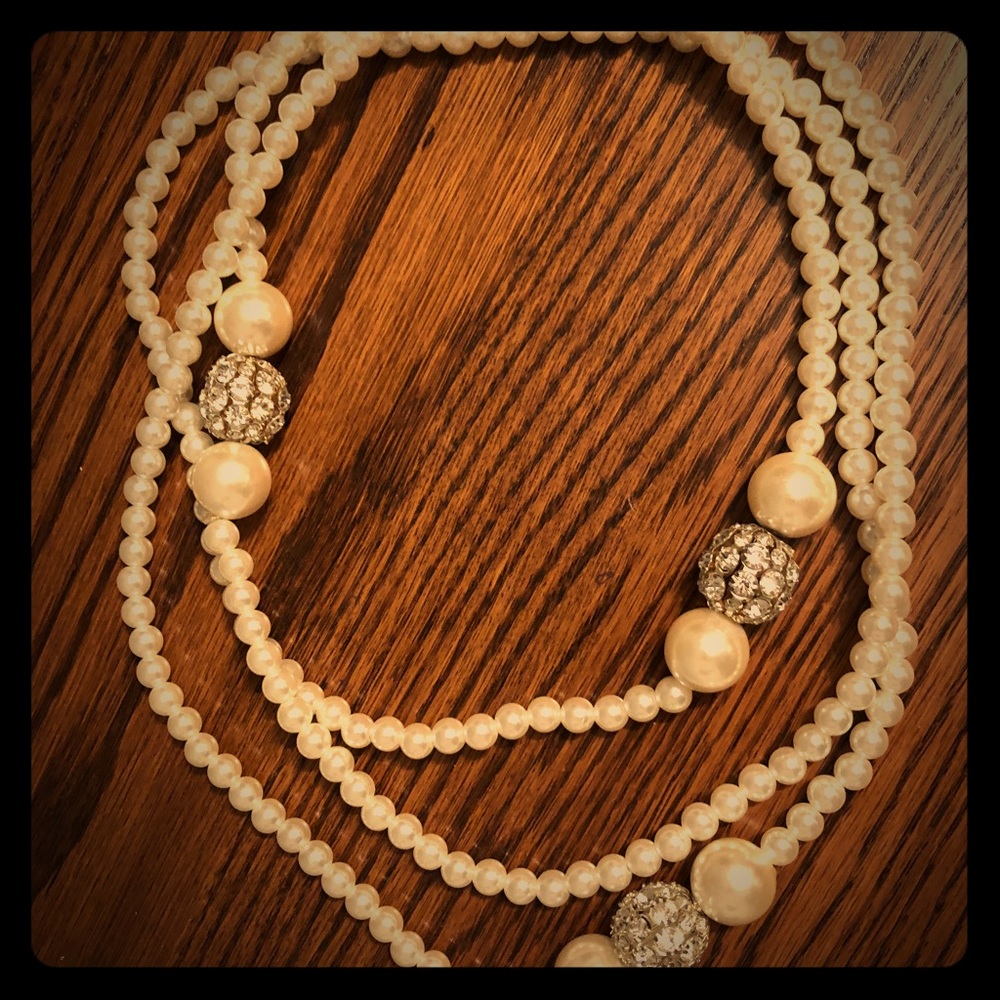Long strand of Pearl Beads with a bit of bling!